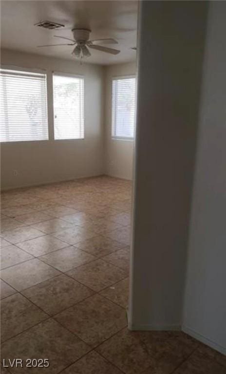 1003 Dover Glen Dr, North Las Vegas, NV 89031 - empty room with visible vents and ceiling fan