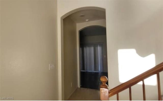 8768 Charm Canyon Ave, Las Vegas, NV 89178 - corridor with arched walkways