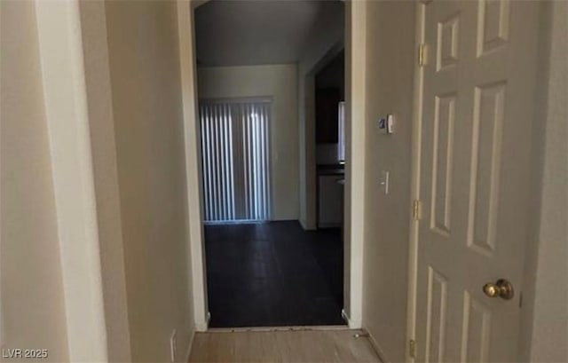 8768 Charm Canyon Ave, Las Vegas, NV 89178 - hall featuring baseboards and wood finished floors