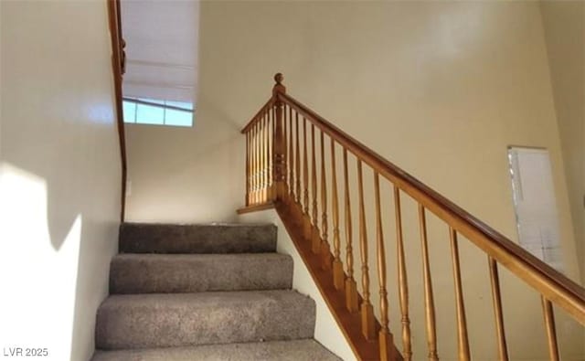 8768 Charm Canyon Ave, Las Vegas, NV 89178 - staircase with a high ceiling