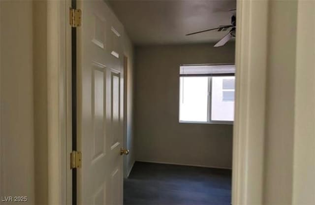 8768 Charm Canyon Ave, Las Vegas, NV 89178 - hallway with dark wood-style floors