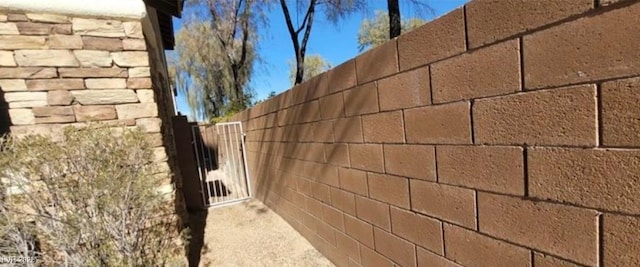 8768 Charm Canyon Ave, Las Vegas, NV 89178 - exterior details featuring a gate and fence