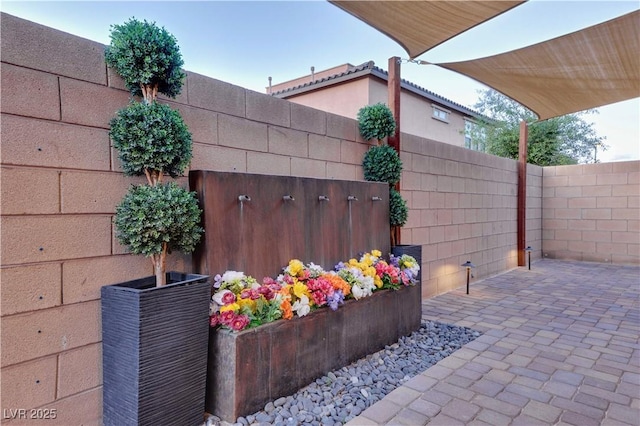 view of patio / terrace with fence