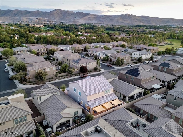 birds eye view of property with a residential view and a mountain view
