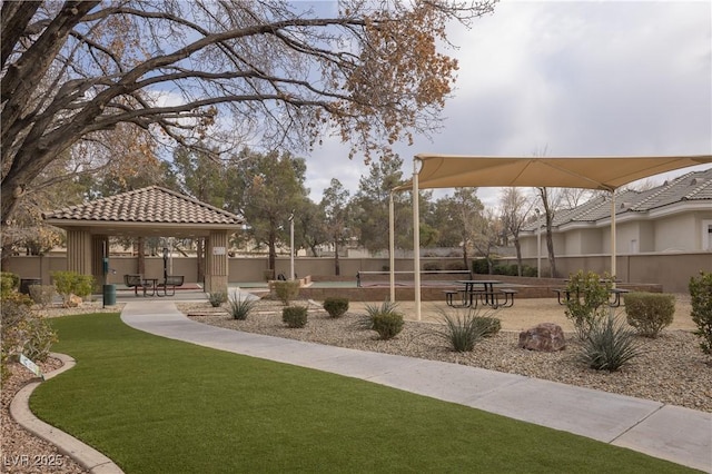 view of home's community featuring a gazebo and a yard