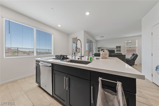 31 Strada Loreto, Henderson, NV 89011 - kitchen with plenty of natural light, a kitchen island with sink, stainless steel dishwasher, and a sink