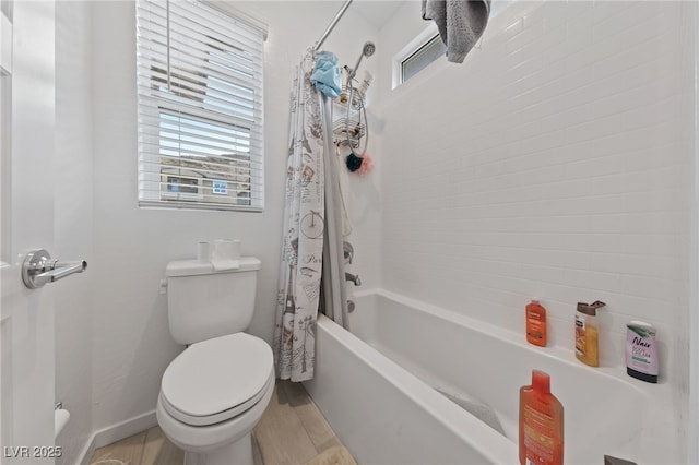 31 Strada Loreto, Henderson, NV 89011 - bathroom featuring shower / tub combo, wood finished floors, a wealth of natural light, and toilet