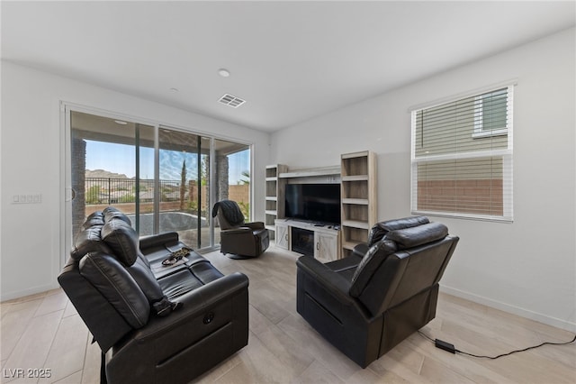 31 Strada Loreto, Henderson, NV 89011 - living area featuring baseboards and visible vents