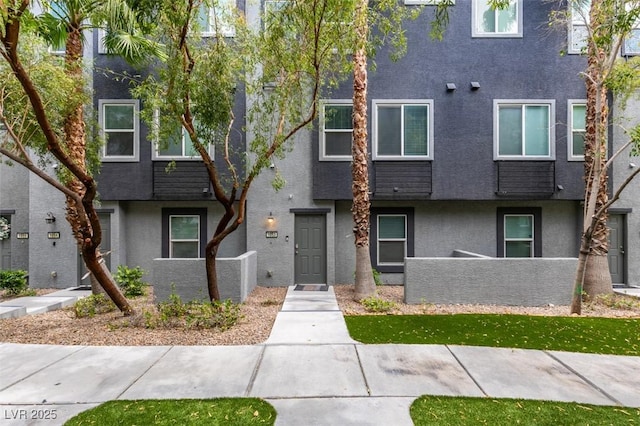 view of property with stucco siding