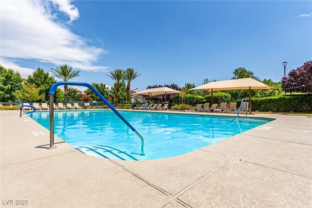 pool featuring a patio area