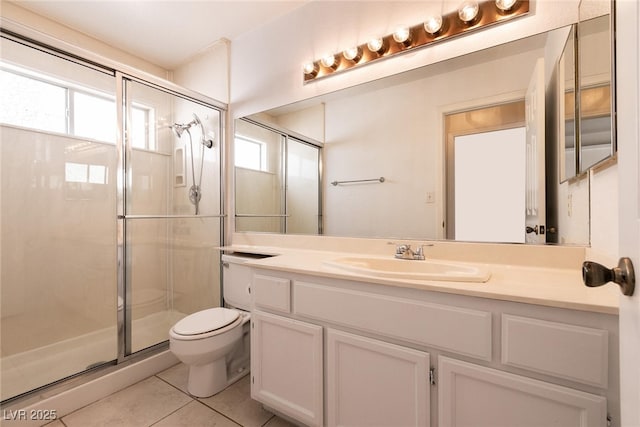 7620 Tortola Bay Ln, Las Vegas, NV 89128 - bathroom with tile patterned floors, a healthy amount of sunlight, toilet, and a shower stall