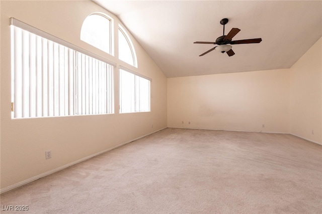 7620 Tortola Bay Ln, Las Vegas, NV 89128 - spare room featuring baseboards, lofted ceiling, a ceiling fan, and carpet