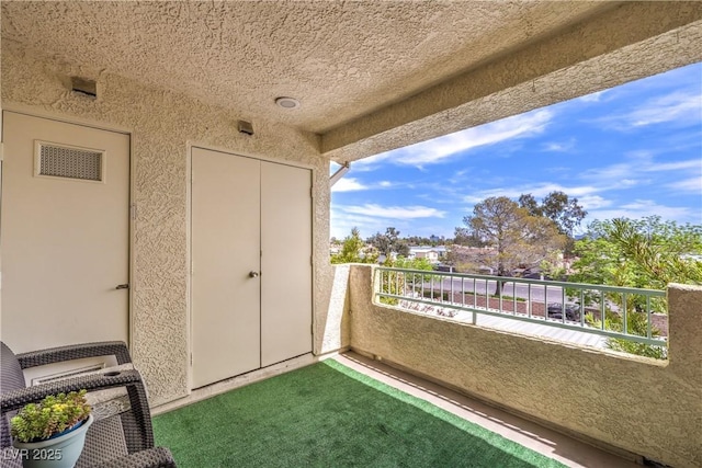 balcony featuring visible vents
