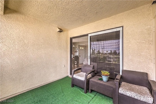 view of patio with a balcony