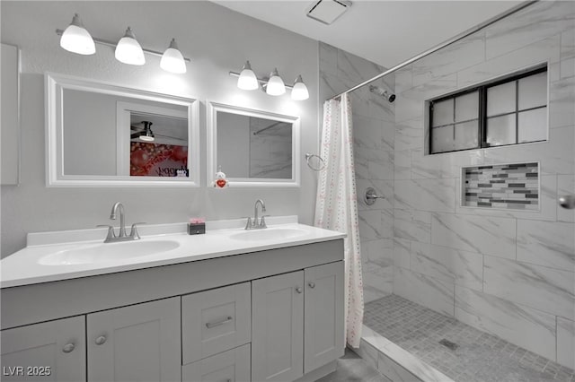 2080 Karen Ave Unit 1, Las Vegas, NV 89169 - bathroom featuring double vanity and tiled shower