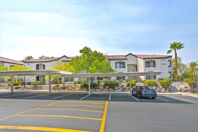 950 Seven Hills Dr Unit 116, Henderson, NV 89052 - covered parking lot featuring stairway