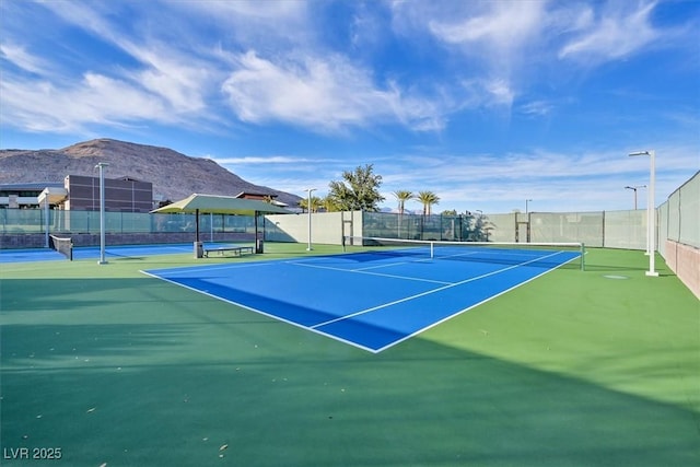10150 Emerald Sunset Ct, Las Vegas, NV 89148 - view of sport court featuring fence and a mountain view
