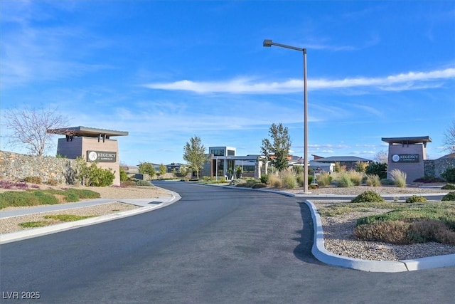 10150 Emerald Sunset Ct, Las Vegas, NV 89148 - view of street featuring sidewalks, curbs, and street lighting