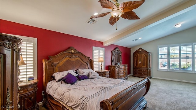 carpeted bedroom with baseboards, visible vents, lofted ceiling with beams, and ceiling fan
