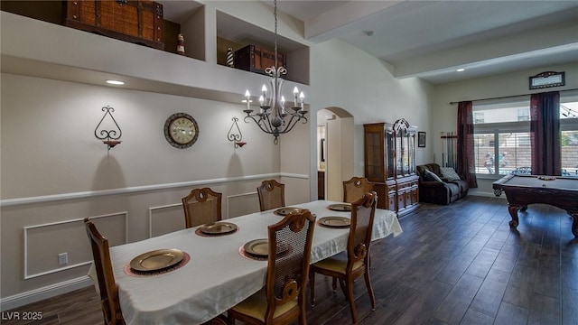 dining area featuring arched walkways, pool table, beam ceiling, a notable chandelier, and dark wood-style floors