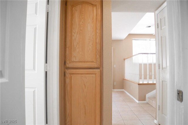 9704 Falling Star Ave, Las Vegas, NV 89117 - hall with light tile patterned flooring and baseboards