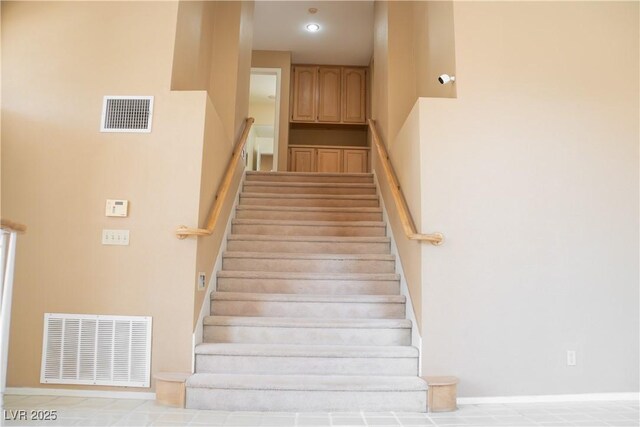 9704 Falling Star Ave, Las Vegas, NV 89117 - staircase with baseboards