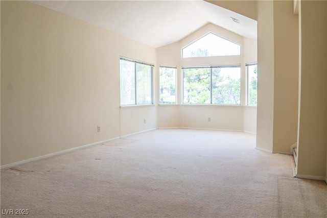 9704 Falling Star Ave, Las Vegas, NV 89117 - spare room with vaulted ceiling, light carpet, and baseboards