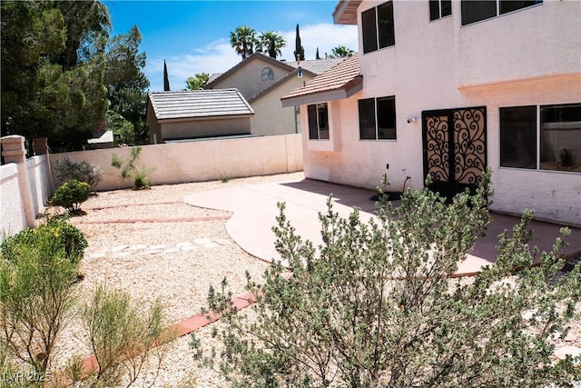 9704 Falling Star Ave, Las Vegas, NV 89117 - view of yard with a patio