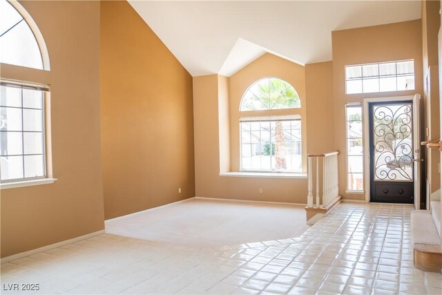 9704 Falling Star Ave, Las Vegas, NV 89117 - foyer entrance with high vaulted ceiling and plenty of natural light