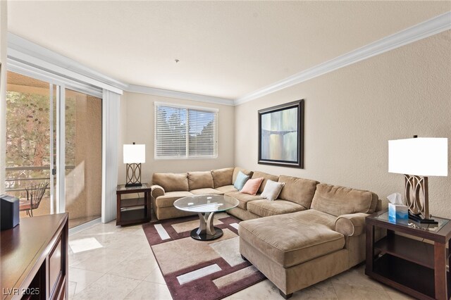 220 E Flamingo Rd Unit 111, Las Vegas, NV 89169 - living room with crown molding, plenty of natural light, a textured wall, and light tile patterned flooring