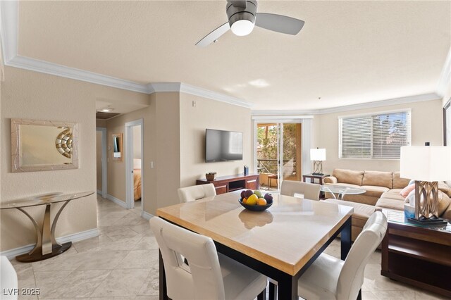 220 E Flamingo Rd Unit 111, Las Vegas, NV 89169 - dining room with crown molding, baseboards, and a ceiling fan