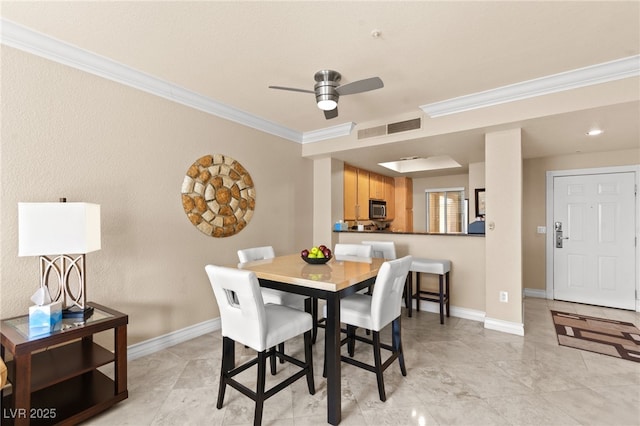 220 E Flamingo Rd Unit 111, Las Vegas, NV 89169 - dining area with ornamental molding, a ceiling fan, and baseboards