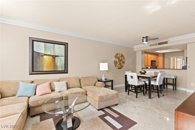 220 E Flamingo Rd Unit 111, Las Vegas, NV 89169 - living area featuring ornamental molding, baseboards, and ceiling fan