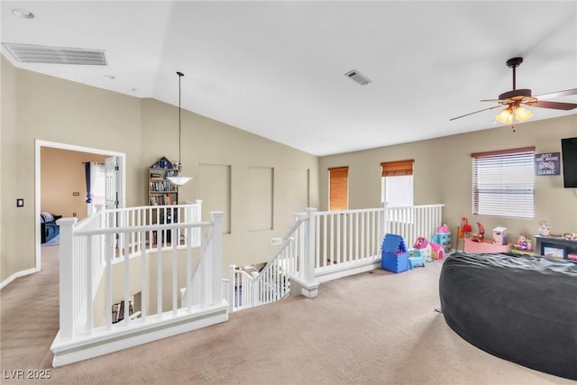 bedroom with carpet and lofted ceiling