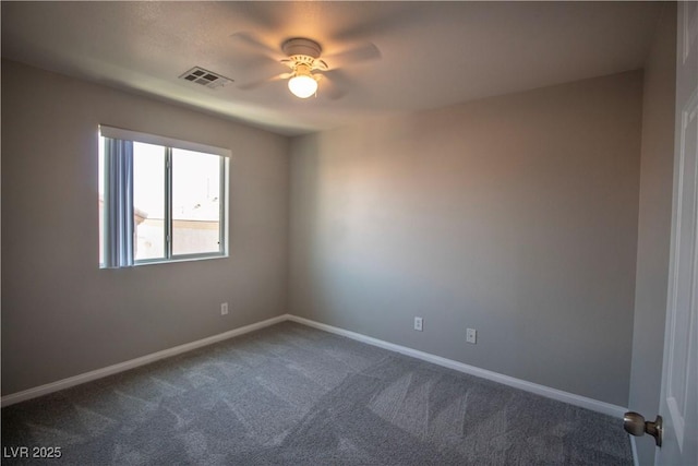 6652 Weeping Pine St, Las Vegas, NV 89149 - unfurnished room featuring dark colored carpet, ceiling fan, and baseboards