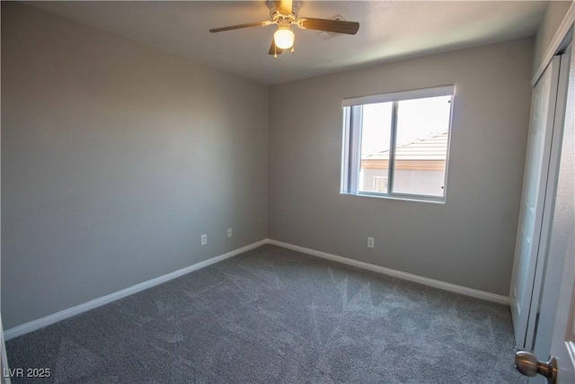 6652 Weeping Pine St, Las Vegas, NV 89149 - spare room with dark colored carpet, baseboards, and ceiling fan