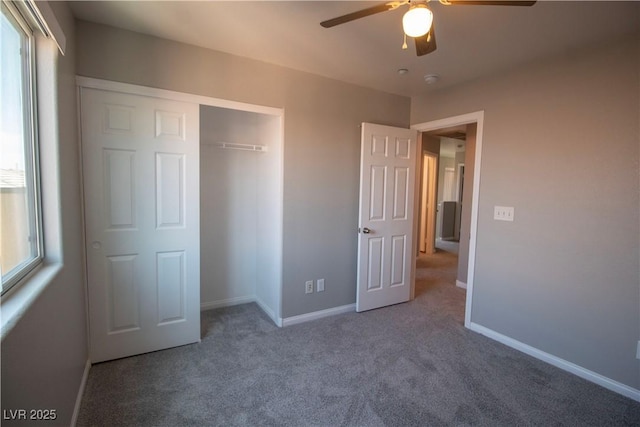 6652 Weeping Pine St, Las Vegas, NV 89149 - unfurnished bedroom with carpet flooring, multiple windows, and baseboards
