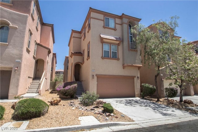 6652 Weeping Pine St, Las Vegas, NV 89149 - view of front of house featuring stucco siding, a garage, and driveway