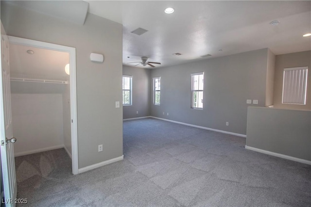 6652 Weeping Pine St, Las Vegas, NV 89149 - unfurnished bedroom with a spacious closet, carpet floors, baseboards, recessed lighting, and a ceiling fan