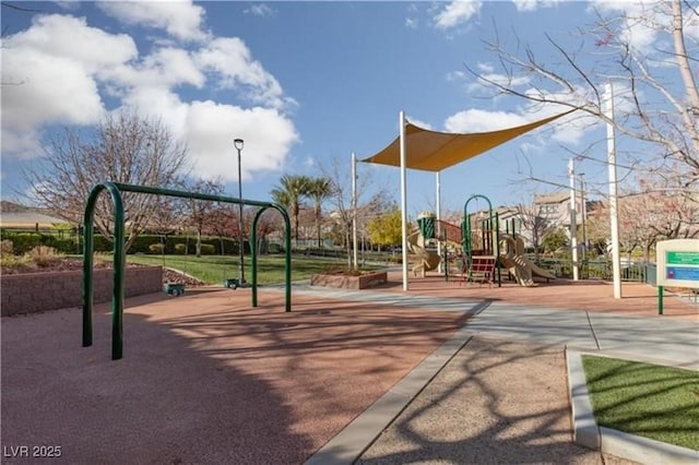 view of home's community featuring playground community