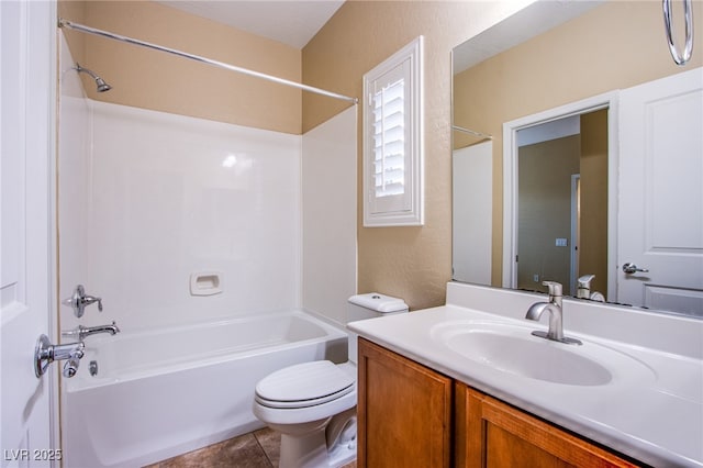 bathroom with tile patterned flooring, tub / shower combination, toilet, and vanity