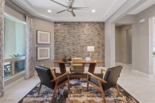 2910 Raywood Ash Dr, Las Vegas, NV 89138 - sitting room with a tray ceiling, baseboards, recessed lighting, a ceiling fan, and marble finish floor