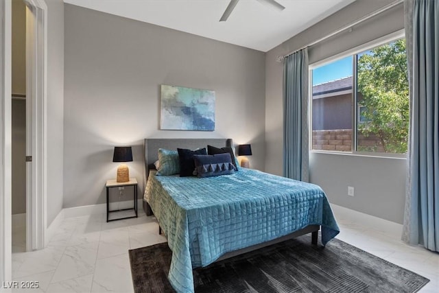 2910 Raywood Ash Dr, Las Vegas, NV 89138 - bedroom featuring baseboards, a ceiling fan, and marble finish floor