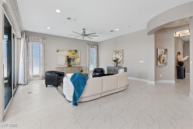 2910 Raywood Ash Dr, Las Vegas, NV 89138 - living area featuring visible vents, baseboards, recessed lighting, a ceiling fan, and marble finish floor