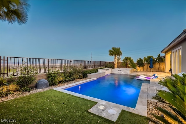2910 Raywood Ash Dr, Las Vegas, NV 89138 - view of pool with a yard, a fenced in pool, and a fenced backyard