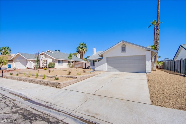 3118 Floral Vista Ave, Henderson, NV 89014 - ranch-style house featuring concrete driveway, fence, stucco siding, and a garage