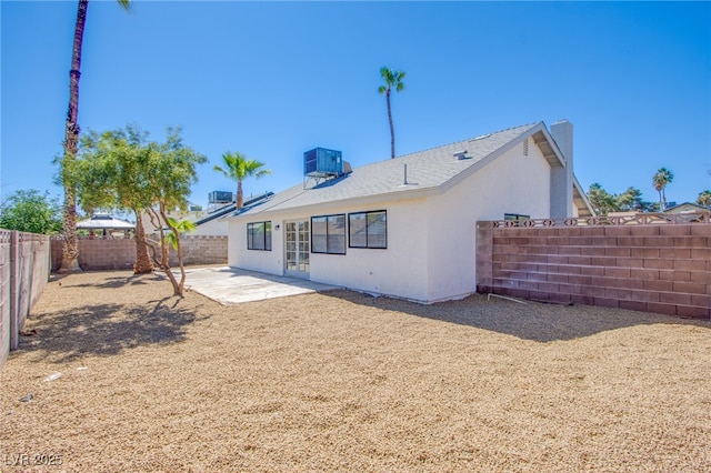 3118 Floral Vista Ave, Henderson, NV 89014 - back of house featuring a patio area, a fenced backyard, and stucco siding