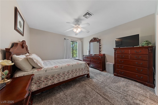 bedroom with a ceiling fan, visible vents, and carpet