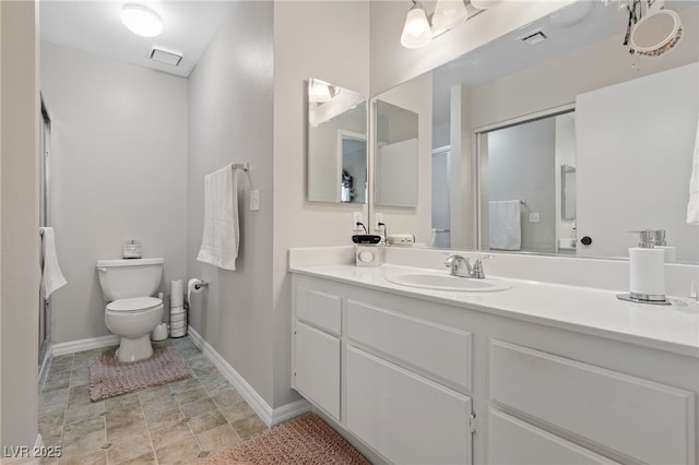 full bathroom featuring vanity, baseboards, toilet, an enclosed shower, and visible vents