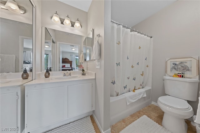 bathroom featuring tile patterned floors, connected bathroom, vanity, shower / tub combo with curtain, and toilet